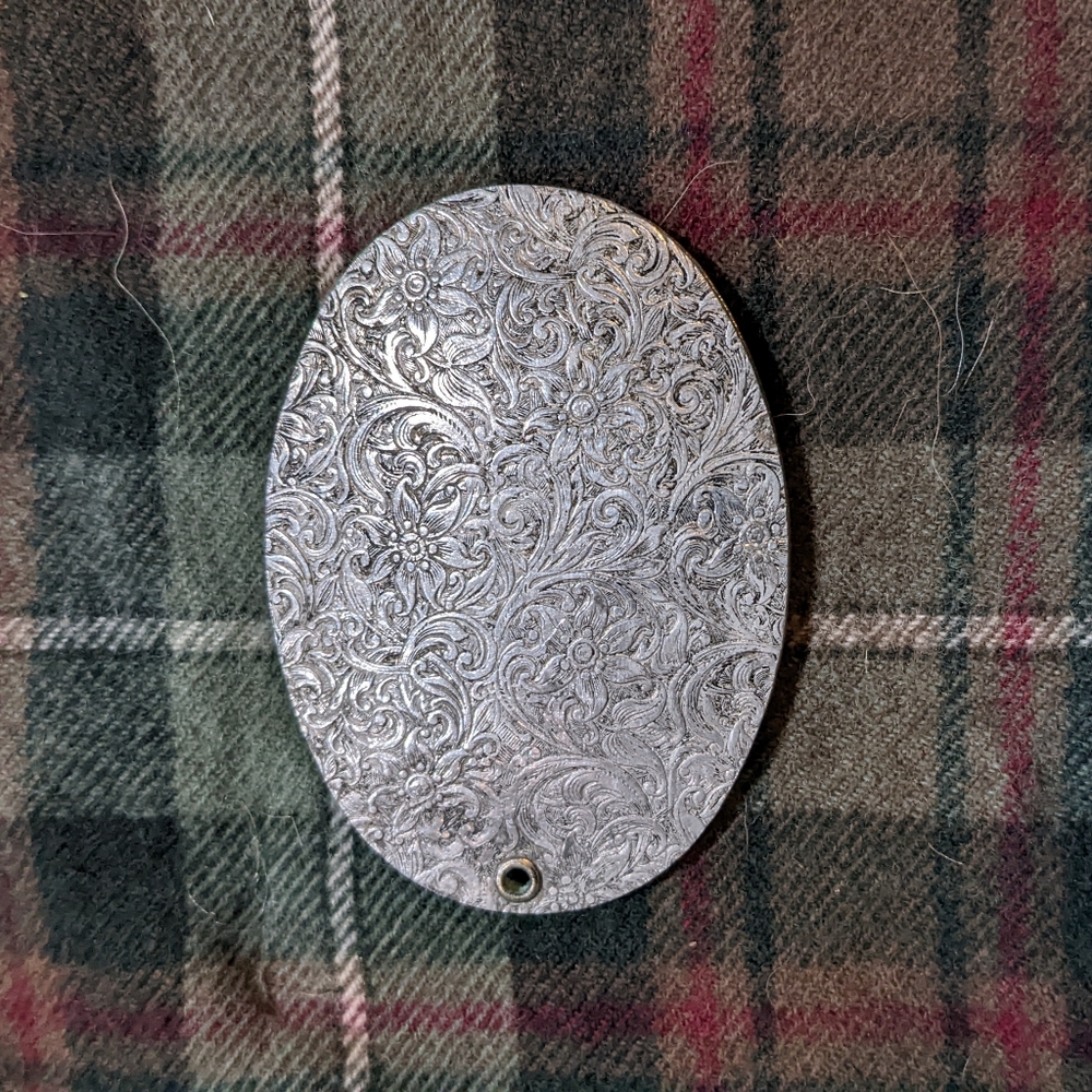 antique silver locket type thing